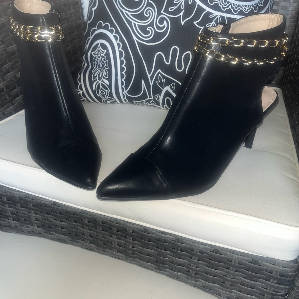 Black and Gold Ankle Boots with Sleek Silhouette